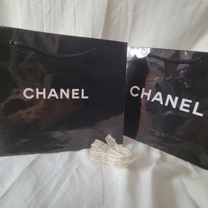 Two Chanel Cosmetic Shopping Bags & Ribbon